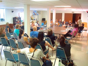 Reiko Ward with the Fulton County DA's office addresses the group.