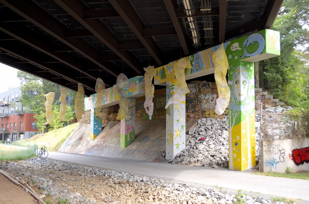These hanging 'sculptures' are crafted from plastic barrier fencing. Chris Jones and Bud Shenefelt's creation titled Tissue: Permutations can be seen under the N. Highland Ave. overpass.