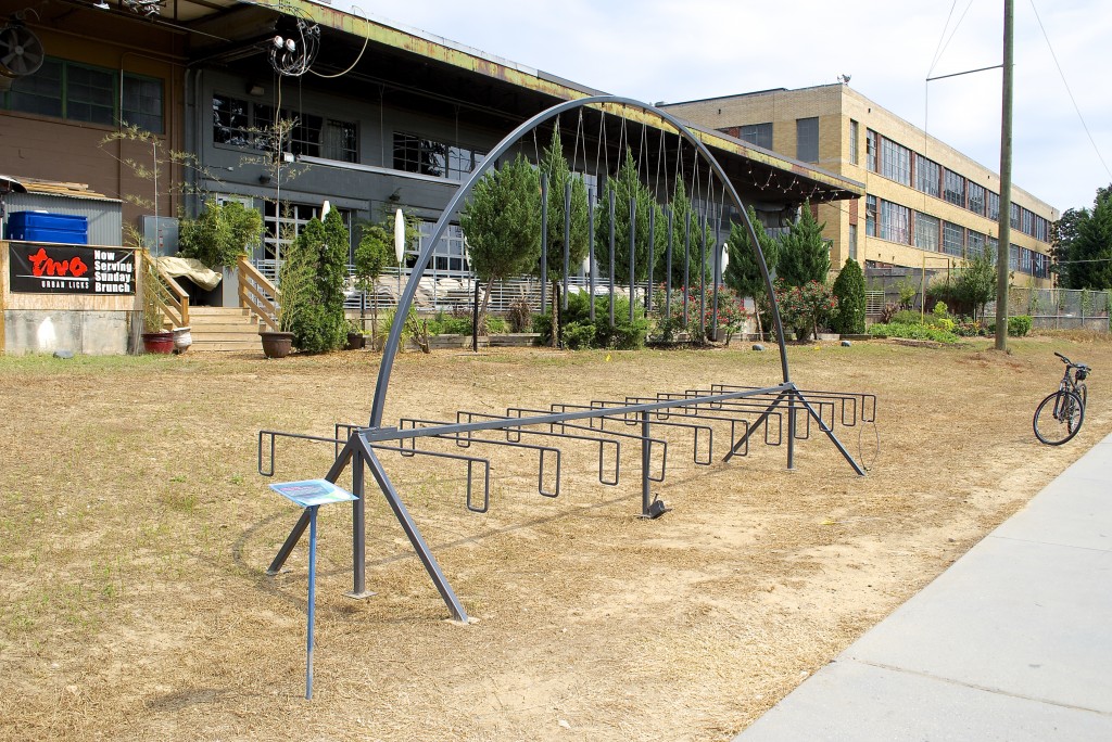 David Lewis Bean's If You Build It, They Will Come is a functional bike rack with tubular bells hanging above it that plays Georgia On My Mind when struck. Very cool.