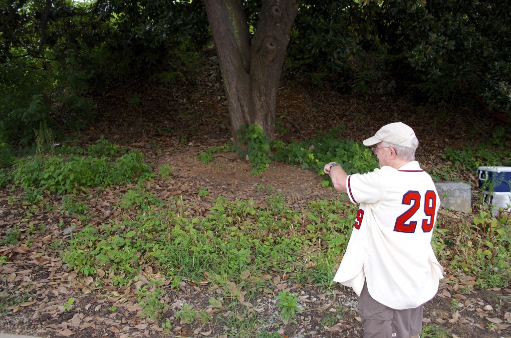 Oreon Mann points out where he and his stepmother buried his father's ashes when he died in 1990.