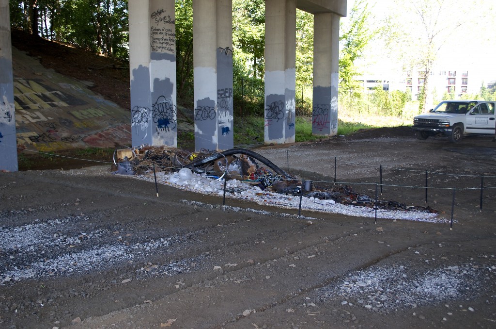 Approach from the south - what's this pile of junk lying under the bridge??