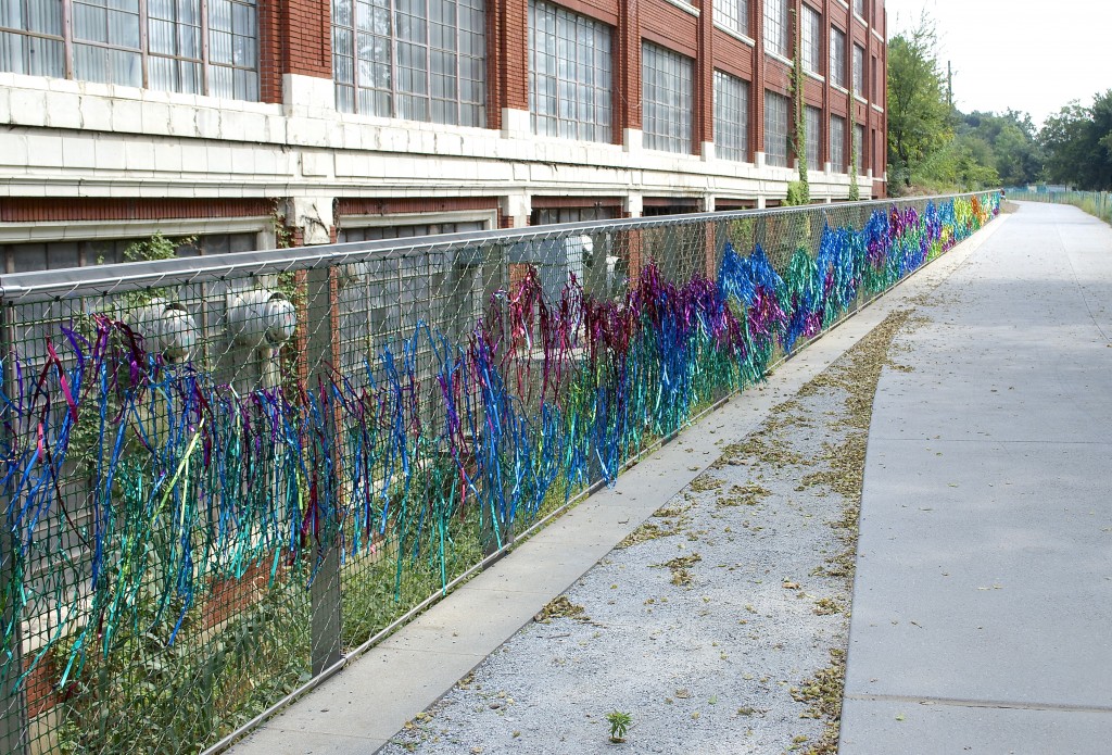 'A Million Flecks of Light' from The Experience Collective adorns the fencing along the trail's east side just south of the Ponce bridge (between Ford Factory Lofts and Ponce City Market).