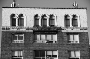 The Briarcliff Summit building features a stylized Mediterranean top floor with arched windows. Photo courtesy of Robin Davis Photography.